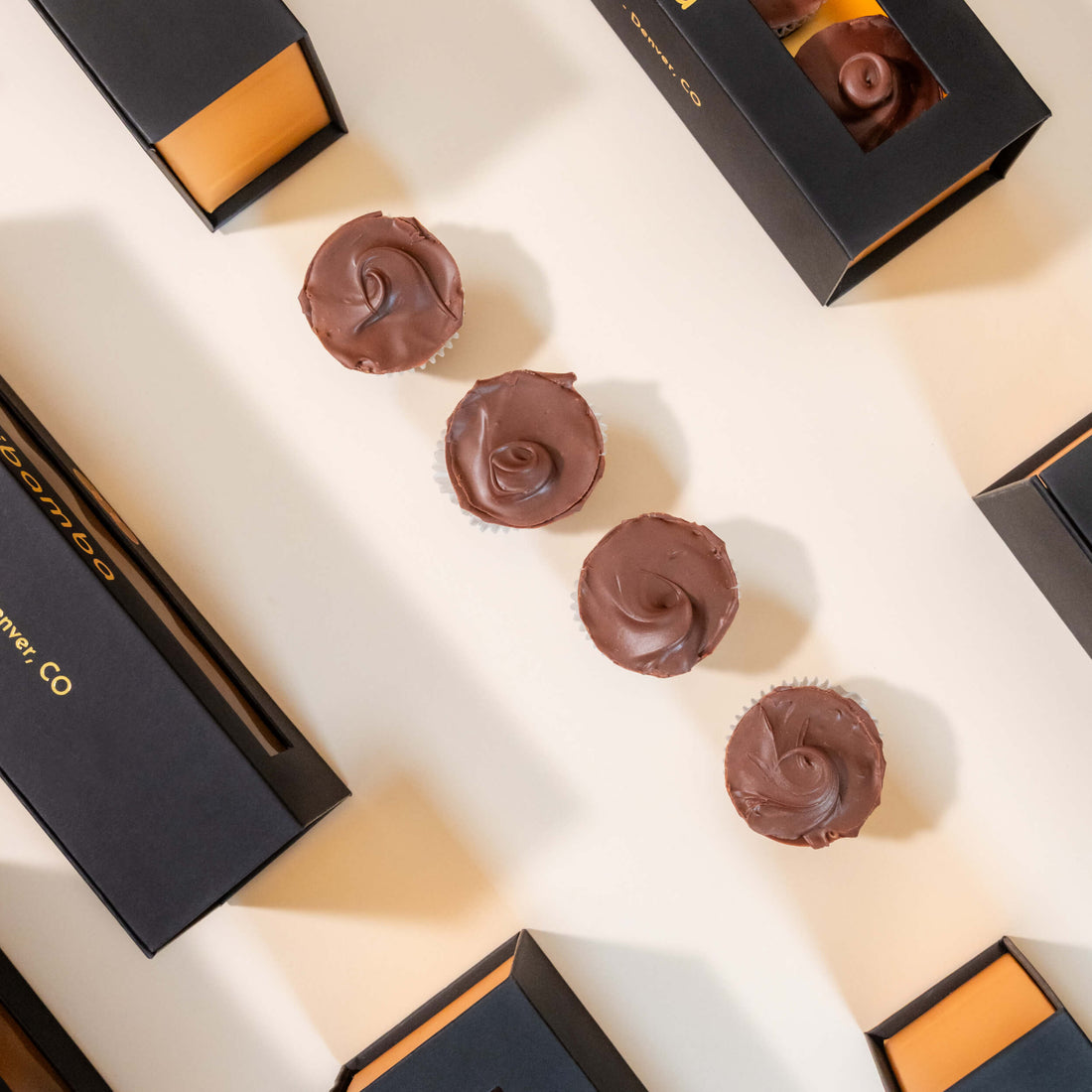 Four Bibamba peanut butter cups, available in dark or milk chocolate
