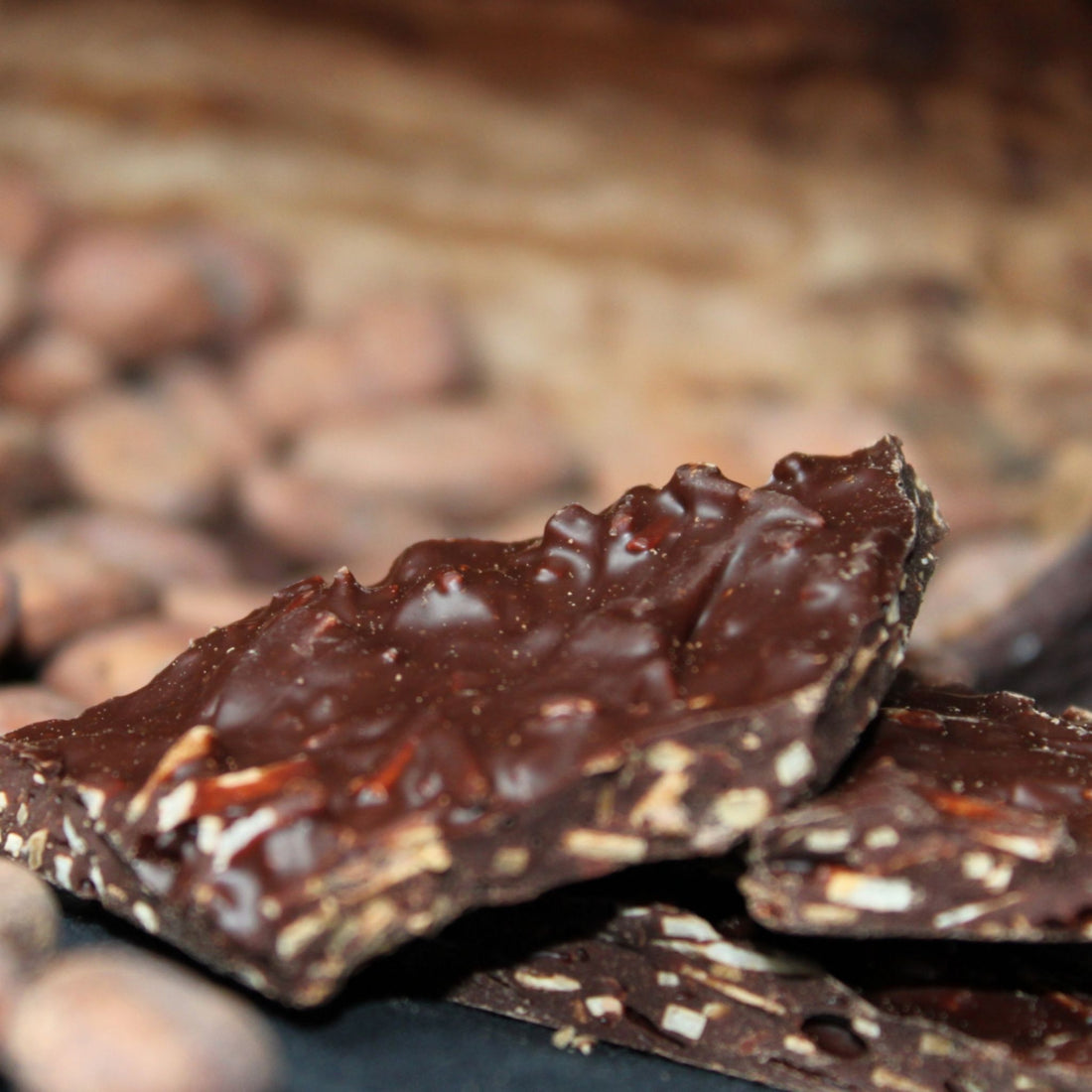 Close-up of dark chocolate pieces with a blurred background